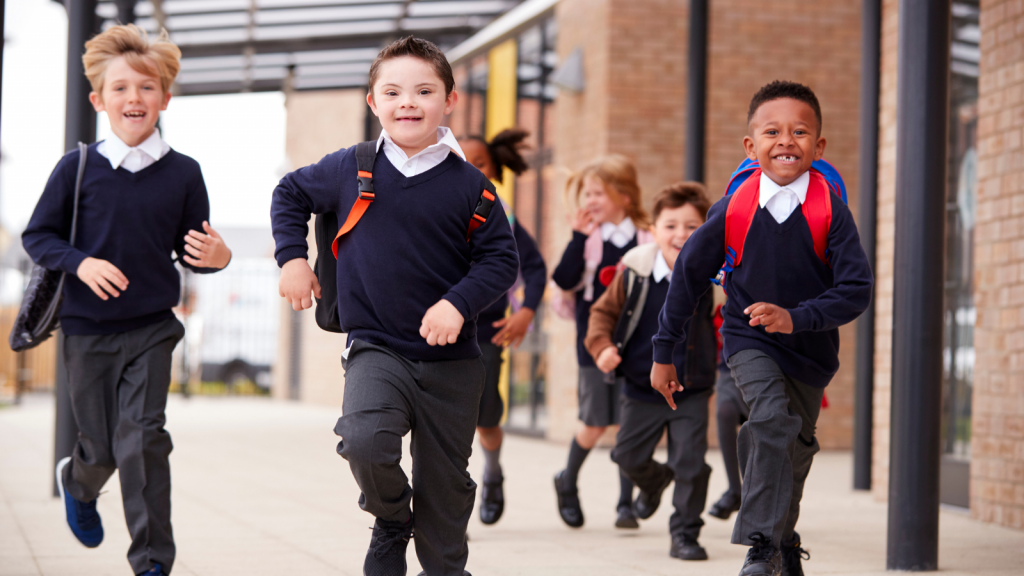 school children running including four boys and two girls